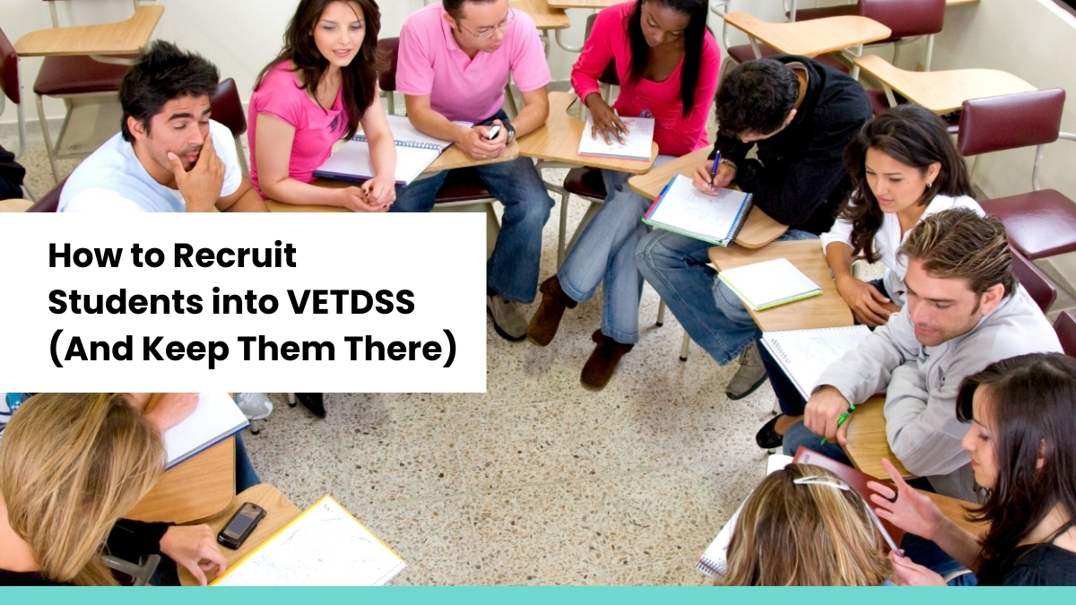 Group of diverse students sitting in a classroom, collaborating and taking notes, representing VETDSS recruitment and retention.